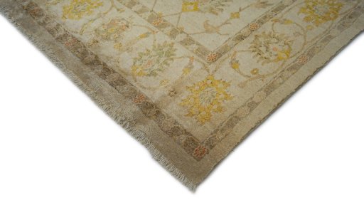 Backside of handmade New Isfahan rug showing knot structure and weave density