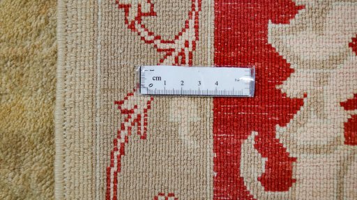 Corner detail of New Isfahan rug showing border pattern and Wool pile