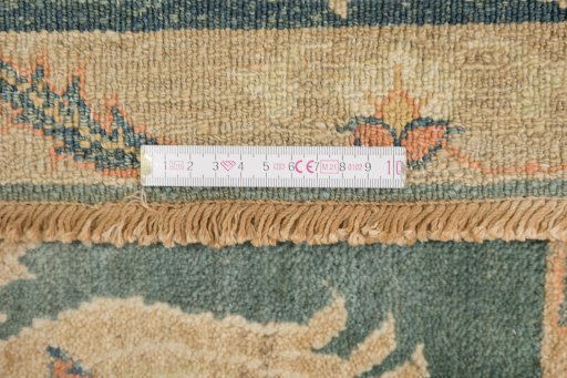 Corner detail of New Isfahan rug showing border pattern and Wool pile