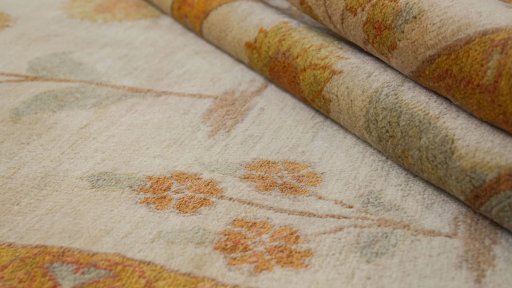 Close-up detail of New Isfahan rug from Iran / Persia showing Wool weave