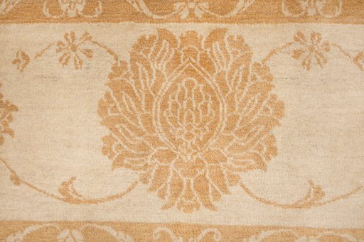 Corner detail of New Isfahan rug showing border pattern and Wool pile