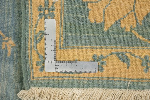 Corner detail of New Isfahan rug showing border pattern and Wool pile
