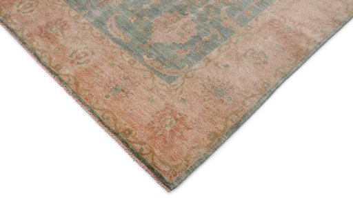 Backside of handmade New Isfahan rug showing knot structure and weave density