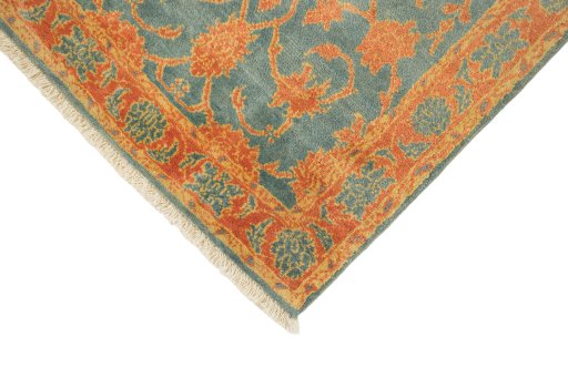 Backside of handmade New Isfahan rug showing knot structure and weave density