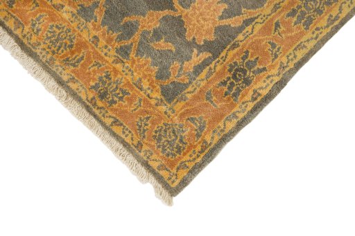 Backside of handmade New Isfahan rug showing knot structure and weave density