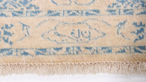 Close-up detail of New Isfahan rug from Iran / Persia showing Wool weave