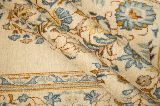 Corner detail of 1950s Kashan rug showing border pattern and Wool pile
