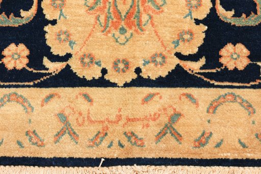 Backside of handmade 1990s Isfahan rug showing knot structure and weave density