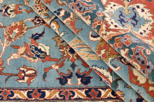 Corner detail of 1920s Isfahan rug showing border pattern and Wool pile