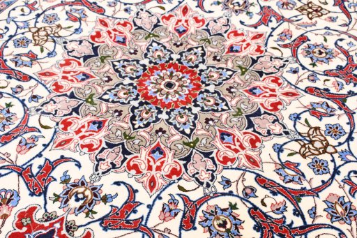 Backside of handmade New Isfahan rug showing knot structure and weave density