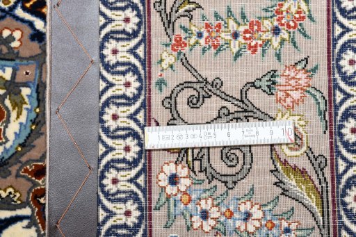 Surface texture of New Isfahan rug with natural Cork and intricate pattern