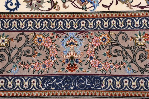 Backside of handmade New Isfahan rug showing knot structure and weave density