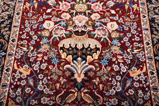 Backside of handmade New Isfahan rug showing knot structure and weave density