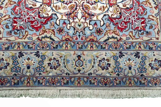 Corner detail of 2000s Isfahan rug showing border pattern and Cork pile