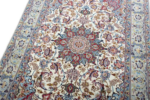 Backside of handmade 2000s Isfahan rug showing knot structure and weave density