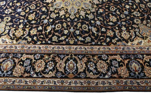 Corner detail of 2000s Isfahan rug showing border pattern and Wool pile