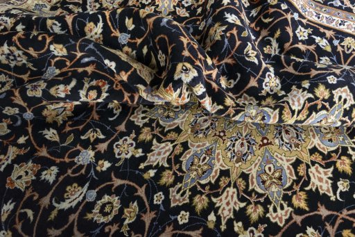 Surface texture of 2000s Isfahan rug with natural Wool and intricate pattern