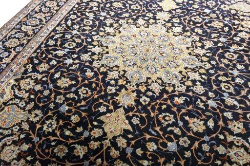 Backside of handmade 2000s Isfahan rug showing knot structure and weave density