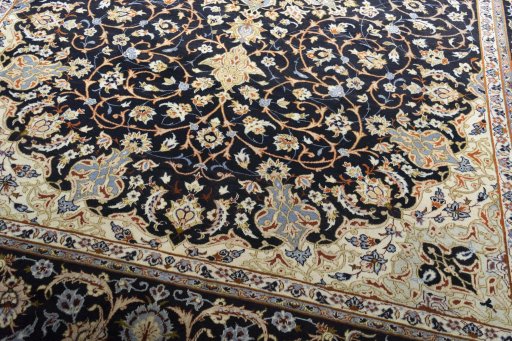 Close-up detail of 2000s Isfahan rug from Iran / Persia showing Wool weave