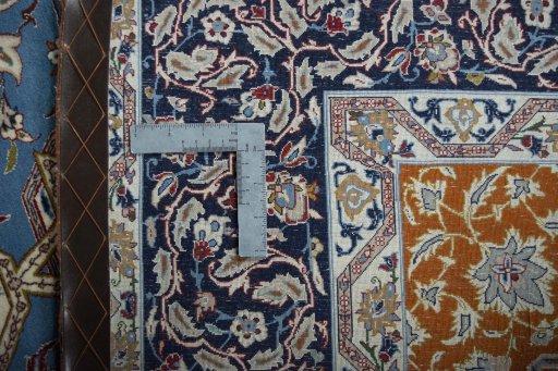 Backside of handmade 1950s Isfahan rug showing knot structure and weave density
