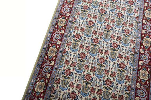 Backside of handmade New Isfahan rug showing knot structure and weave density
