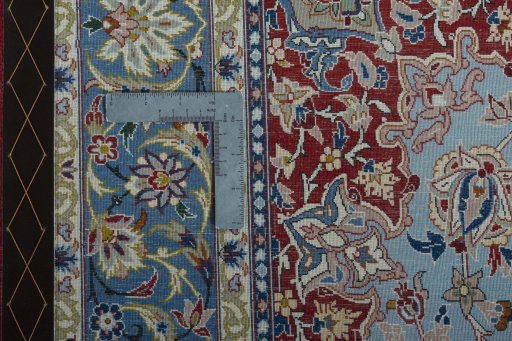 Backside of handmade 1970s Isfahan rug showing knot structure and weave density