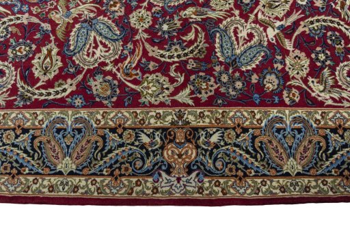 Corner detail of 2000s Isfahan rug showing border pattern and Cork pile