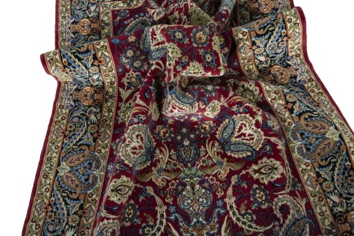 Surface texture of 2000s Isfahan rug with natural Cork and intricate pattern