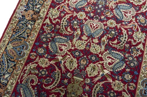 Backside of handmade 2000s Isfahan rug showing knot structure and weave density