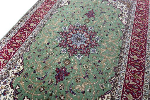 Backside of handmade New Isfahan rug showing knot structure and weave density