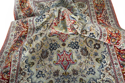 Backside of handmade 2000s Isfahan rug showing knot structure and weave density