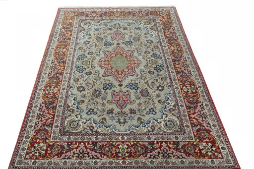 Surface texture of 2000s Isfahan rug with natural Cork and intricate pattern