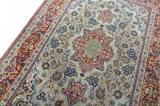 Backside of handmade 2000s Isfahan rug showing knot structure and weave density