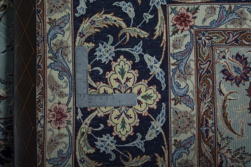 Backside of handmade New Isfahan rug showing knot structure and weave density