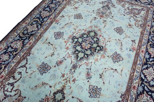 Backside of handmade New Isfahan rug showing knot structure and weave density