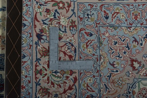 Backside of handmade 2000s Isfahan rug showing knot structure and weave density
