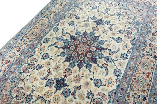 Backside of handmade 2000s Isfahan rug showing knot structure and weave density
