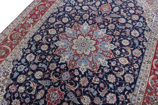 Backside of handmade New Isfahan rug showing knot structure and weave density