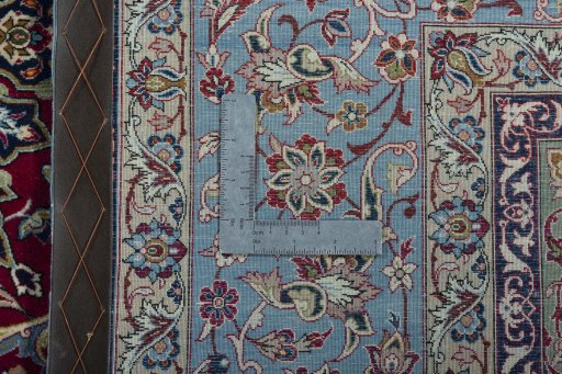 Backside of handmade 1970s Isfahan rug showing knot structure and weave density