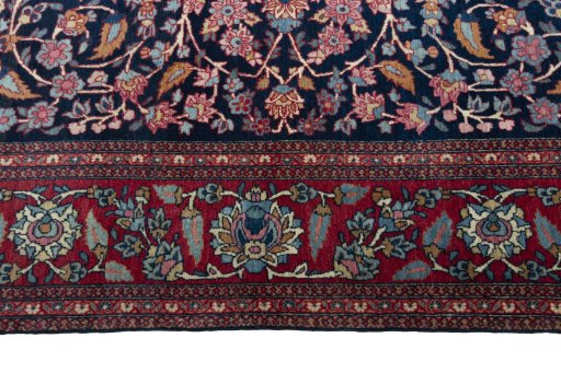Corner detail of 1930s Isfahan rug showing border pattern and Wool pile
