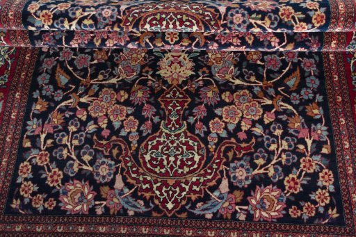 Close-up detail of 1930s Isfahan rug from Iran / Persia showing Wool weave