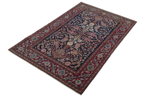 Corner detail of 1930s Isfahan rug showing border pattern and Wool pile