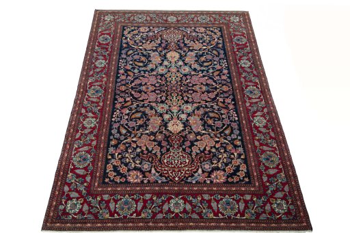 Surface texture of 1930s Isfahan rug with natural Wool and intricate pattern