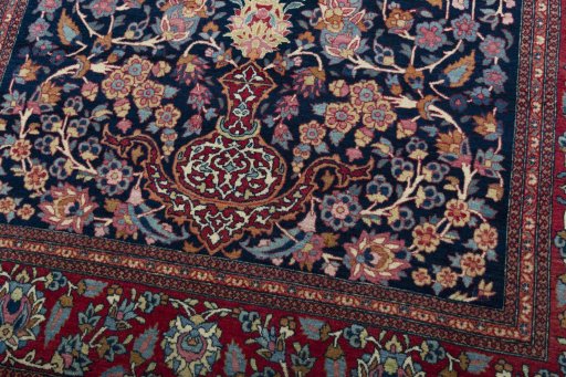 Close-up detail of 1930s Isfahan rug from Iran / Persia showing Wool weave