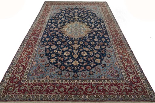 Surface texture of 1950s Isfahan rug with natural Cork and intricate pattern