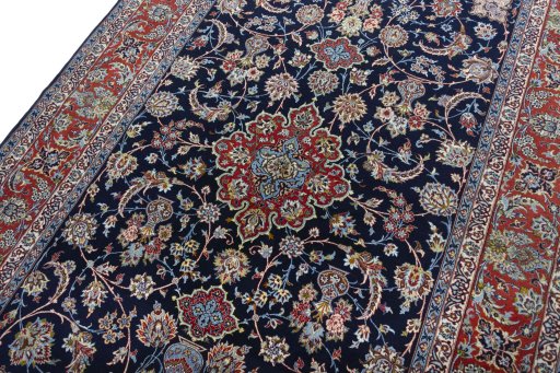 Backside of handmade New Isfahan rug showing knot structure and weave density