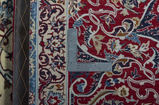 Backside of handmade 1970s Isfahan rug showing knot structure and weave density
