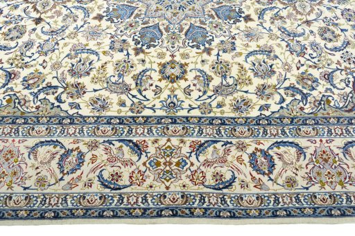 Corner detail of 2000s Isfahan rug showing border pattern and Cork pile