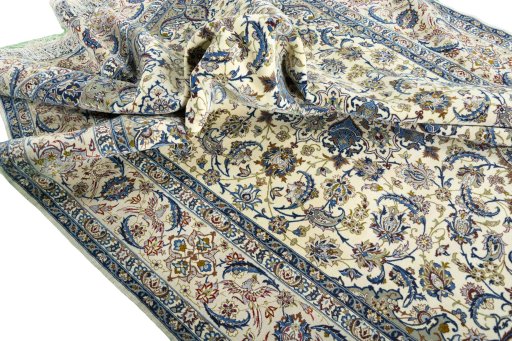 Surface texture of 2000s Isfahan rug with natural Cork and intricate pattern