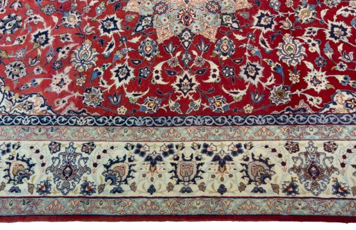 Corner detail of 1970s Isfahan rug showing border pattern and Cork pile